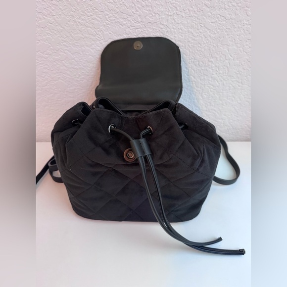 Juicy Couture 2-in-1 Mini Backpack - Licorice
Black with Heart Detail main image 8